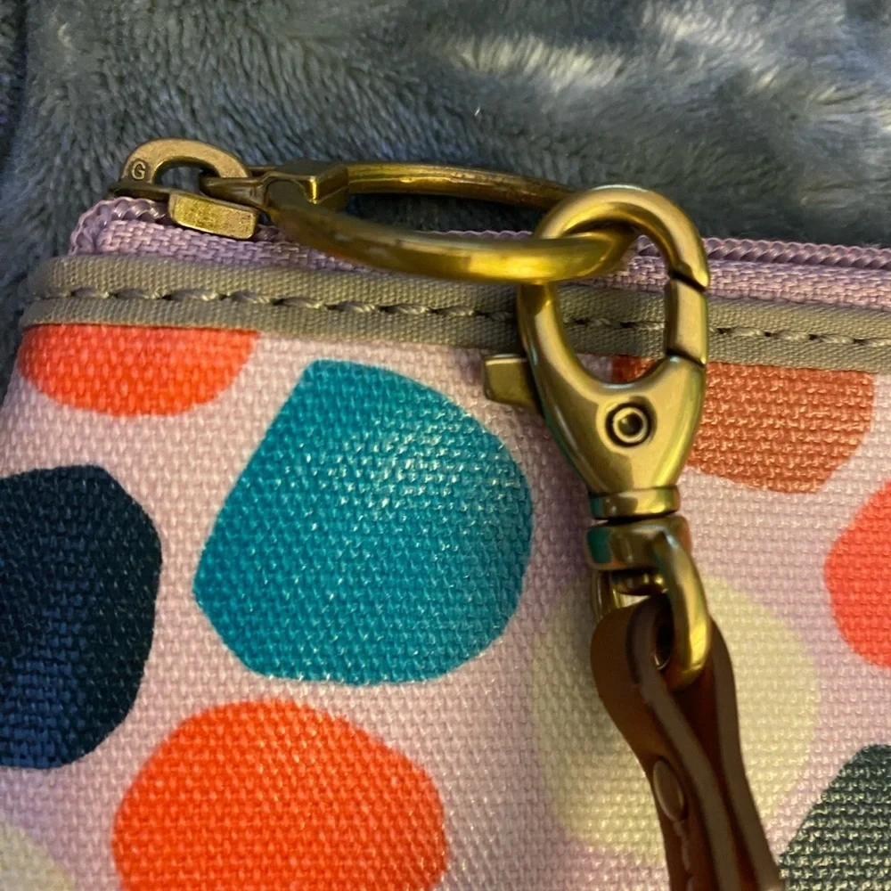Fossil wristlet pinkish with multicolored dots zippered closure card slots. OSP